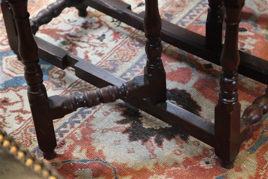 An early 18th century yew wood gateleg table, W.3ft 1in. D.3ft 5in. H.2ft 4in.